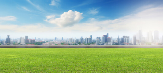 Fototapeta na wymiar Empty lawn floors city skyline and modern business office buildings with blue cloud sky.