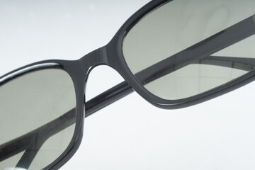 Close Up Center Retro Designer Fashion Sunglasses Black Frames On Natural Background
