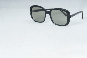 Retro Designer Fashion Sunglasses Black Frames On Natural Background Top Right Corner