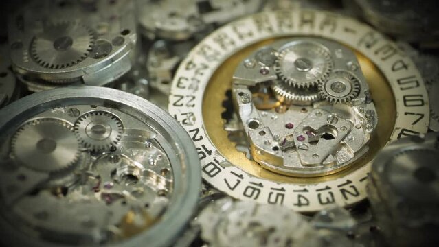 Watch or clock mechanisms, close-up. Retro style of old mechanical watches with gears and cogs. Clockwork details and parts, macro shots. Time or repair concept