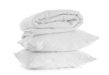 Fototapeta na wymiar Folded blanket and pillows isolated on white background