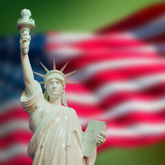 white statue of liberty on USA flag green background