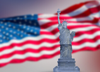 glass statue of liberty on USA flag