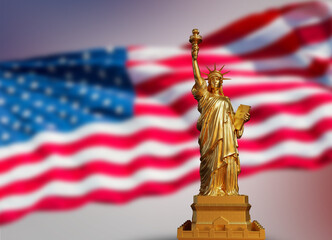 golden statue of liberty on USA flag