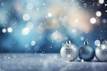 Fototapeta na wymiar Christmas balls on the snow against the backdrop of beautiful blue bokeh and falling snowflakes. Christmas and New Year background. Greeting card with space for text. Festive Christmas decoration
