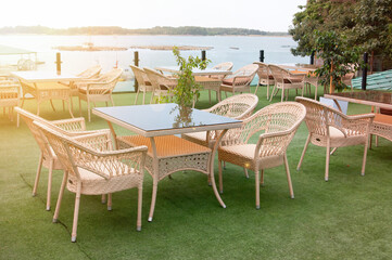 Wicker furniture, summer cafe outside. Tables and chairs. Restaurant