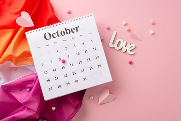 Mark International Lesbian Day with this composition: calendar with highlighted 8th of October, Lesbian Pride flag, heart motifs, "love" inscription on a pastel pink background