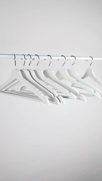 white crossbar hanger minimalistic video,shopping concept. High quality FullHD footage