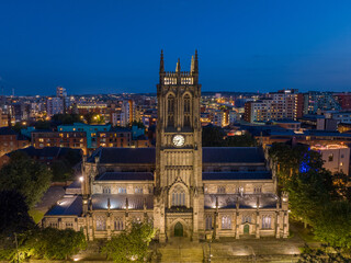 Fototapeta na wymiar Leeds Minster, City Centre church in Leeds, Yorkshire. Aerial view of the large church at night. Christian place of worship in northern england