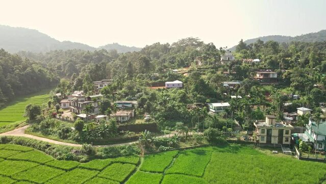 Aerial view of a town located on the mountain hills.