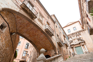 Beautiful steps and archway of the Pujada de Sant Domenec in Girona, Spain