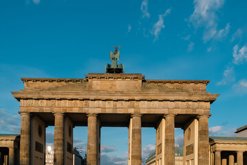 Berlin, Germany: April 19, 2022: Brandenburg gate tour sunset with blue sky.