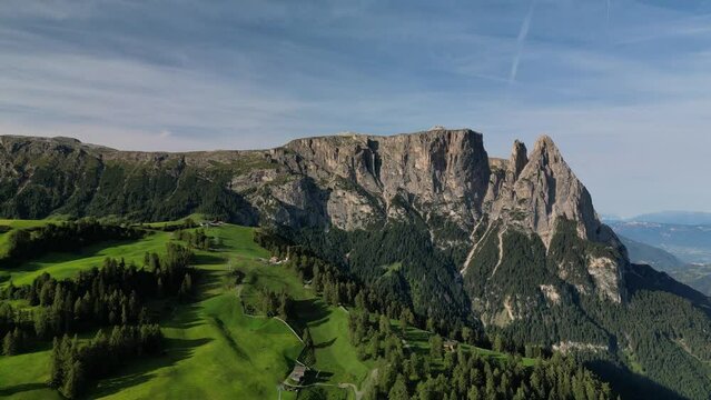 Aerial video of the sunrise in the Dolomites mountains. Compatsch Italy.