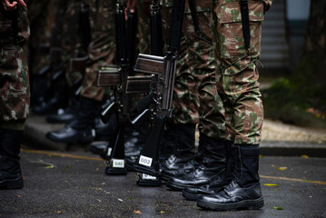 Army soldiers await the start of the Brazilian independence parade in the city of Salvador, Bahia.