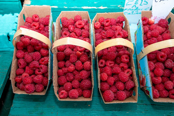 Fresh raspberries for sale at the market