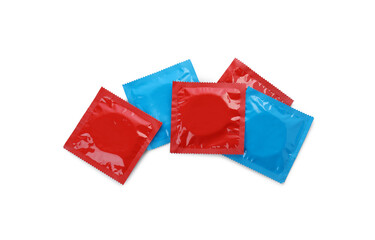 Condom packages isolated on white, top view. Safe sex