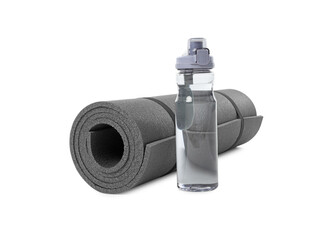 Grey yoga mat and bottle of water isolated on white