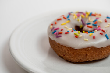 close up of donut on white plate
