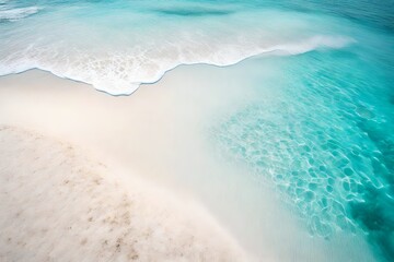 A white sand beach with crystal clear blue water