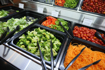  self-service restaurant with a choice of different types vegetable salads