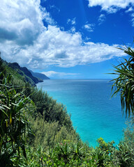 beautiful blue ocean and green hills in Kauai