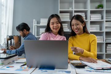 Confident group of asian businessmen working together in office technology creative team brainstorming meeting calculate income graph document internet partner teamwork concept of coworkers.
