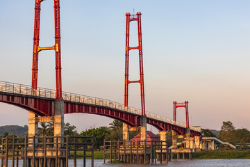 Kumala Island Red Bridge which is access to one of the tourist destinations in Tenggarong City, Kutai Kartanegara Regency, namely Kumala Island.