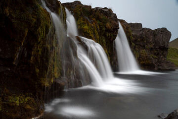 Fototapeta na wymiar Kirkjufellsfoss waterfall longexposure view in Iceland