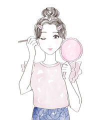 アイラインをかく女性