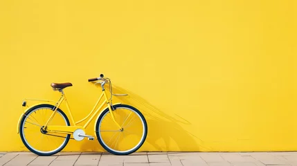 Rollo Fahrrad Vintage bicycle with yellow wall background - vintage filter and soft focus