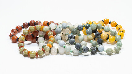 Natural jade gemstone jewelry on white background