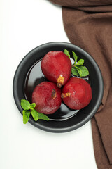 Tasty and delicious food concept - pear in wine