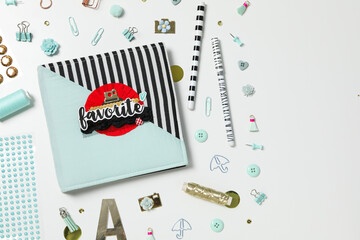 Scrap booking, on a white background, top view.
