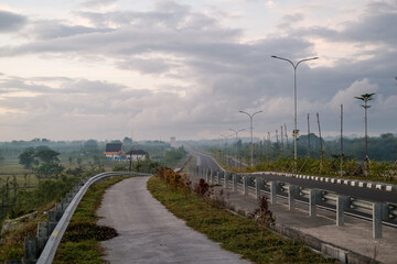 Lombok-Mandalika International Airport Bypass Road in the morning, Lombok bypass road, , road in the countryside, sunrise on the road, sunrise over the road, morning ride in lombok