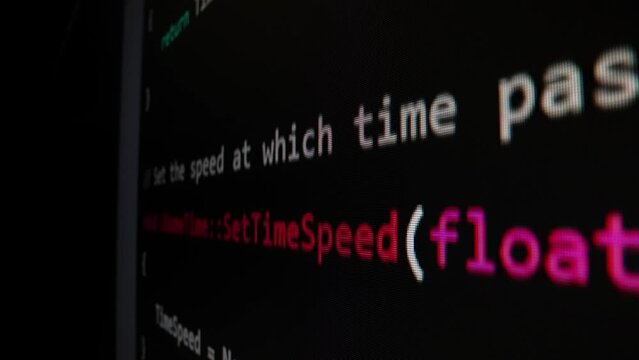 Closeup macro shot movement of coding script moving across LED screen with real-time AI-generated typing, showcasing advanced AI learning in optimization, debug and coding for software development.