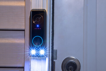 A Smart doorbell at night with smart AI package detection as well as facial recognition and human...