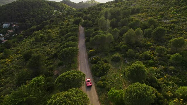 Drone shot over a luxury ferrari in france