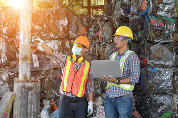 Manufacturers Engineer and tablet working at plastic bag manufacturers.