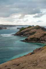 Fototapeta premium incredible views across the coastline at the top of Bukit Merese Hill, Merese Hill is a location to see the sunrise and sunset in Lombok, coast of the sea, beach and sea, view of the, kuta mandalika