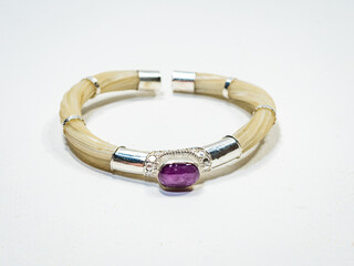 Silver and natural gemstone jewelry on white background