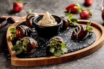 Strawberry Pancake dip with chocolate served in dish isolated on background top view of cafe food