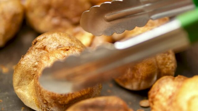 Traditional English Yorkshire pudding rotating on white background. High quality