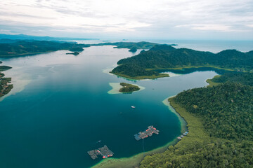 Puncak Mandeh - Aerial View of a blend of natural hills with the beauty of the bay decorated with a group of small islands in the middle of Carocok Tarusan Bay.