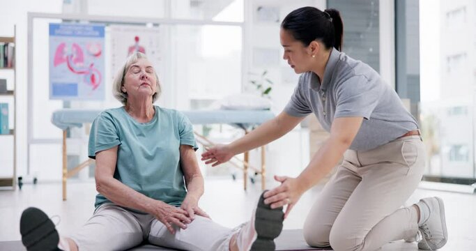 Physical therapy, senior woman and stretching legs for recovery, workout exercise and healing injury. Physiotherapy, elderly patient and chiropractor help in rehabilitation, wellness and body health