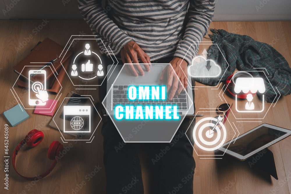 Poster omni channel concept, person using laptop computer with omni channel icon on virtual screen.