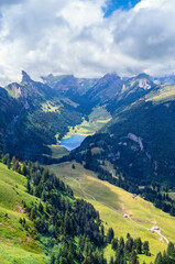 Fototapeta na wymiar A view at the beautiful Swiss mountain landscape of Appenzell with Samtisersee, view from the peak of Hoher Kasten