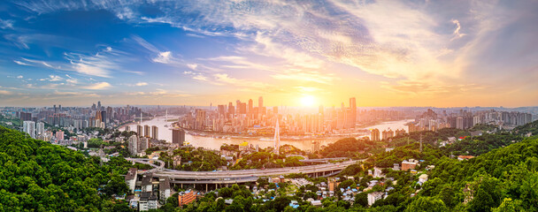Fototapeta premium High angle view of city buildings skyline and natural scenery in Chongqing, China