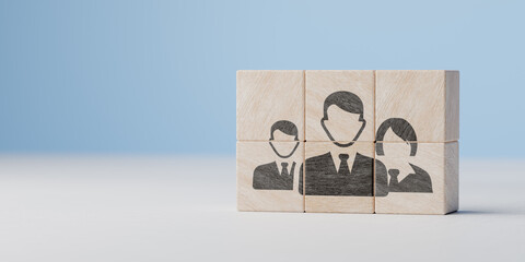 Teamwork. icons with people in business clothes symbolizing teamwork, managers, managers, staff on wooden cubes on blue background. Manager and staff icon print screen on wooden cube blocks