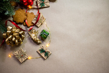 Christmas decoration composition with ribbon, angel, Christmas cookies, top view. Space for copy...