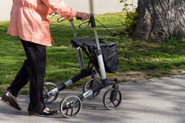 aged lady with rollator